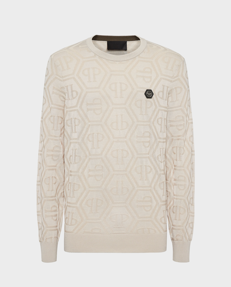 Beżowy sweter z monogramem