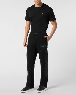 Czarne spodnie dresowe ze skórzanymi naszywkami - Image #1