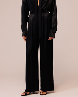 Czarne spodnie satynowe z rozcięciami - Image #0