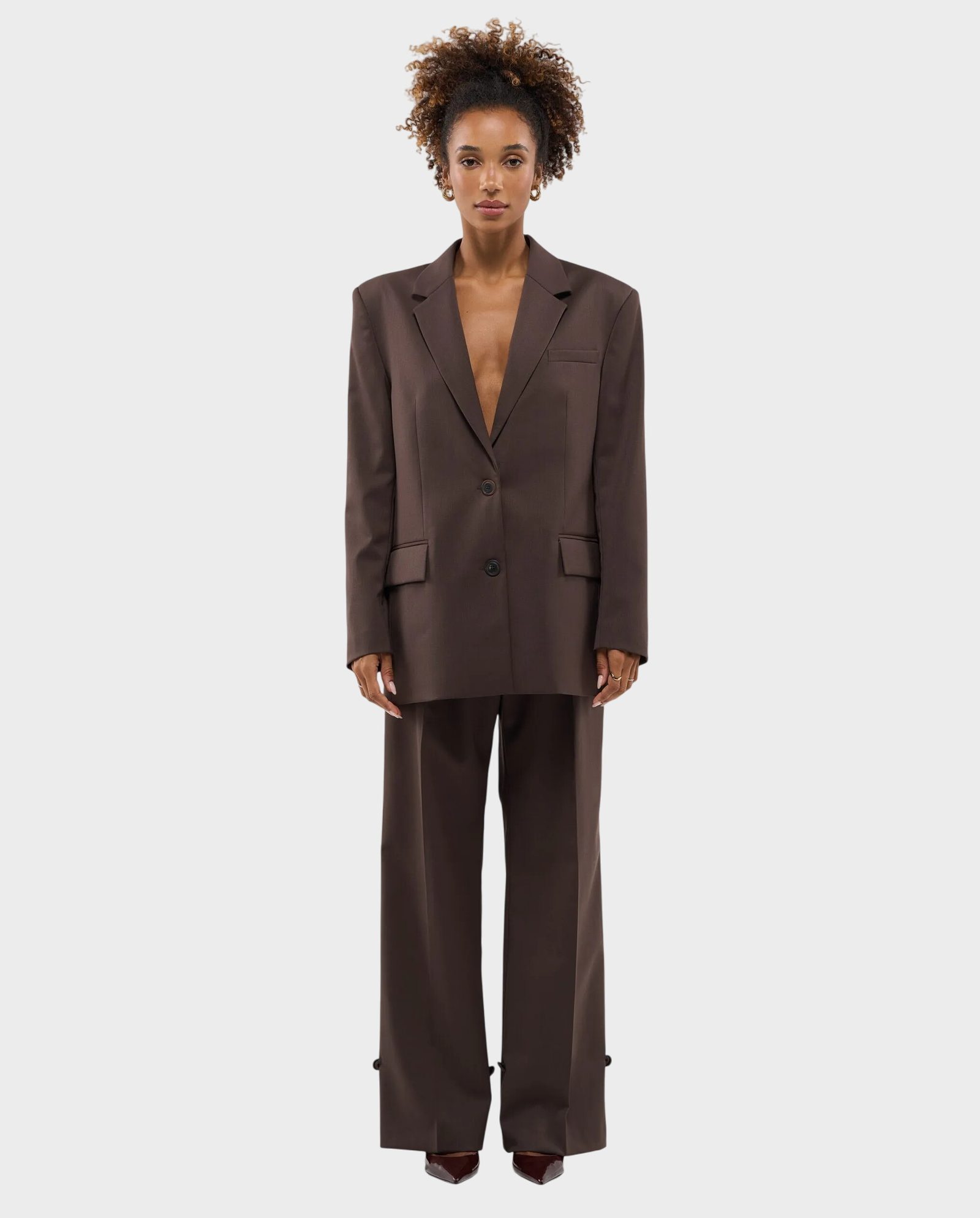 Brązowe spodnie z upięciem - Image #1