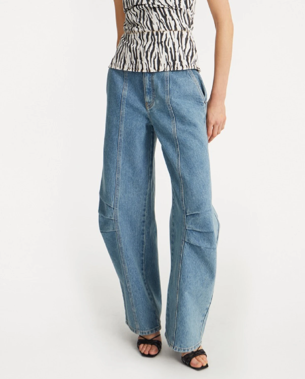 Niebieskie spodnie jeansowe - Image #0