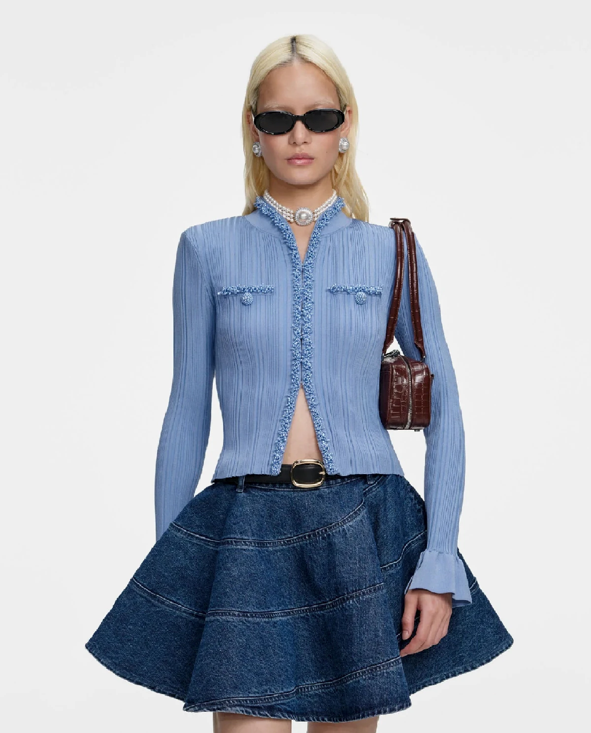 Niebieski kardigan z perłowym wykończeniem - Image #0