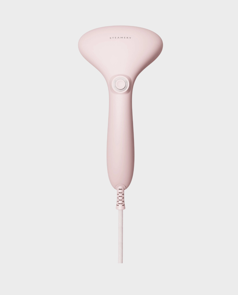 Różowa parownica ręczna do ubrań