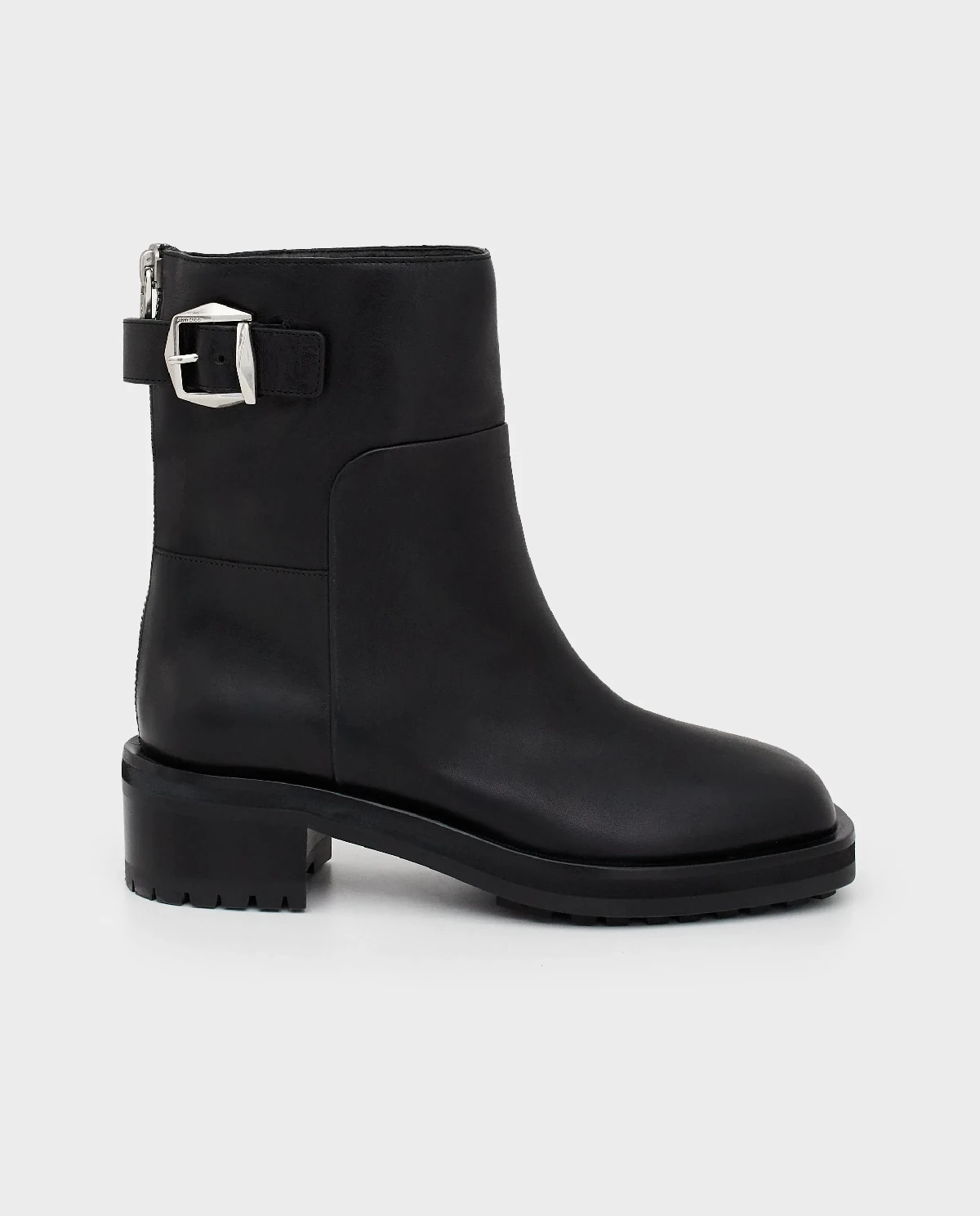 Czarne skórzane botki na obcasie - Image #0