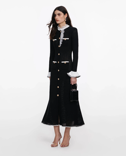 Czarna dzianinowa sukienka midi - Image #1