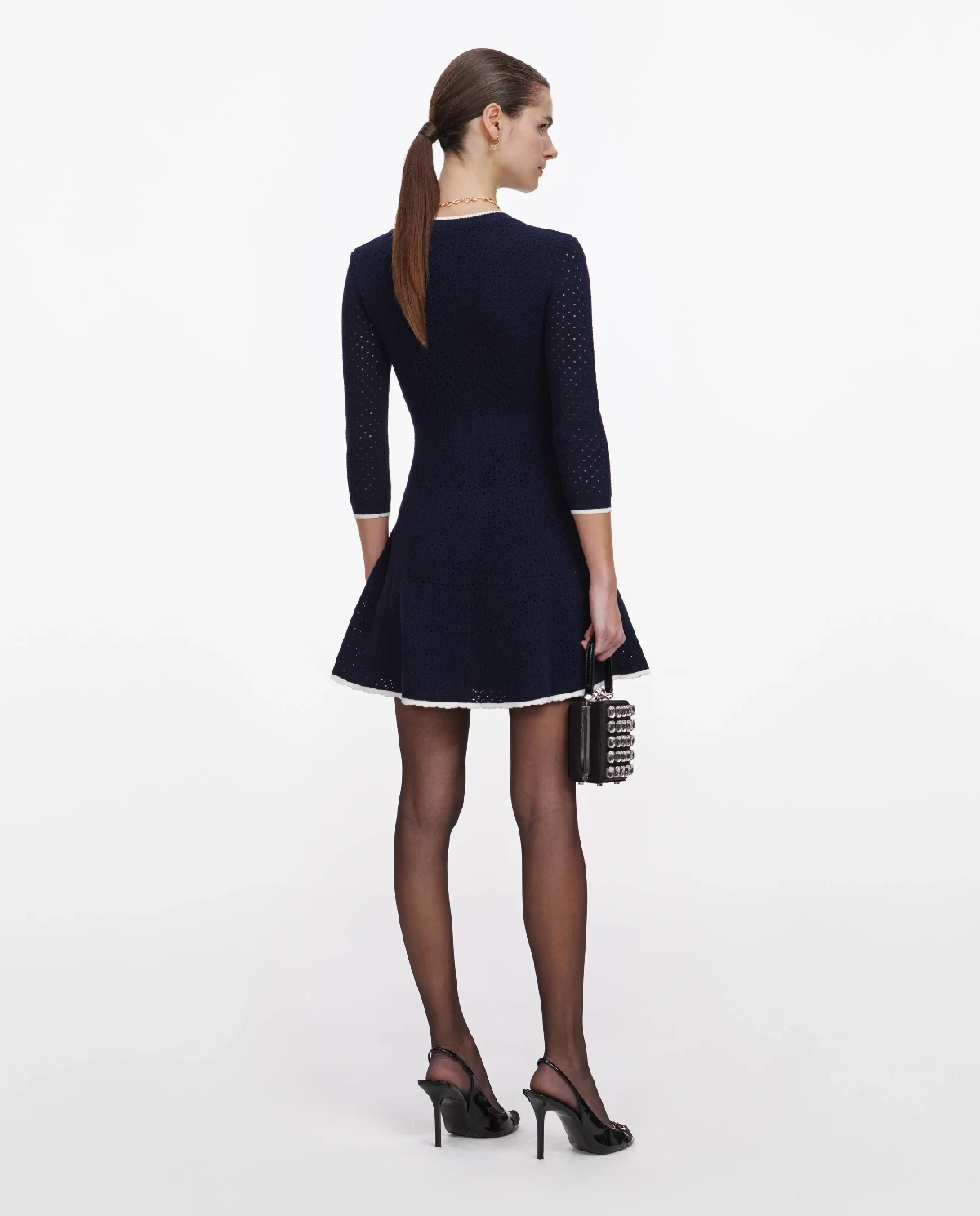 Granatowa dzianinowa sukienka mini z kokardą - Image #2