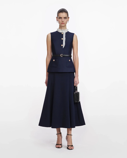 Granatowa sukienka midi z falbaną - Image #0