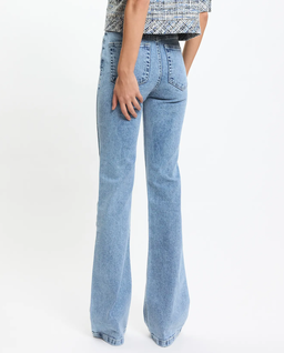 Niebieskie jeansy z rozszerzanymi nogawkami - Image #0