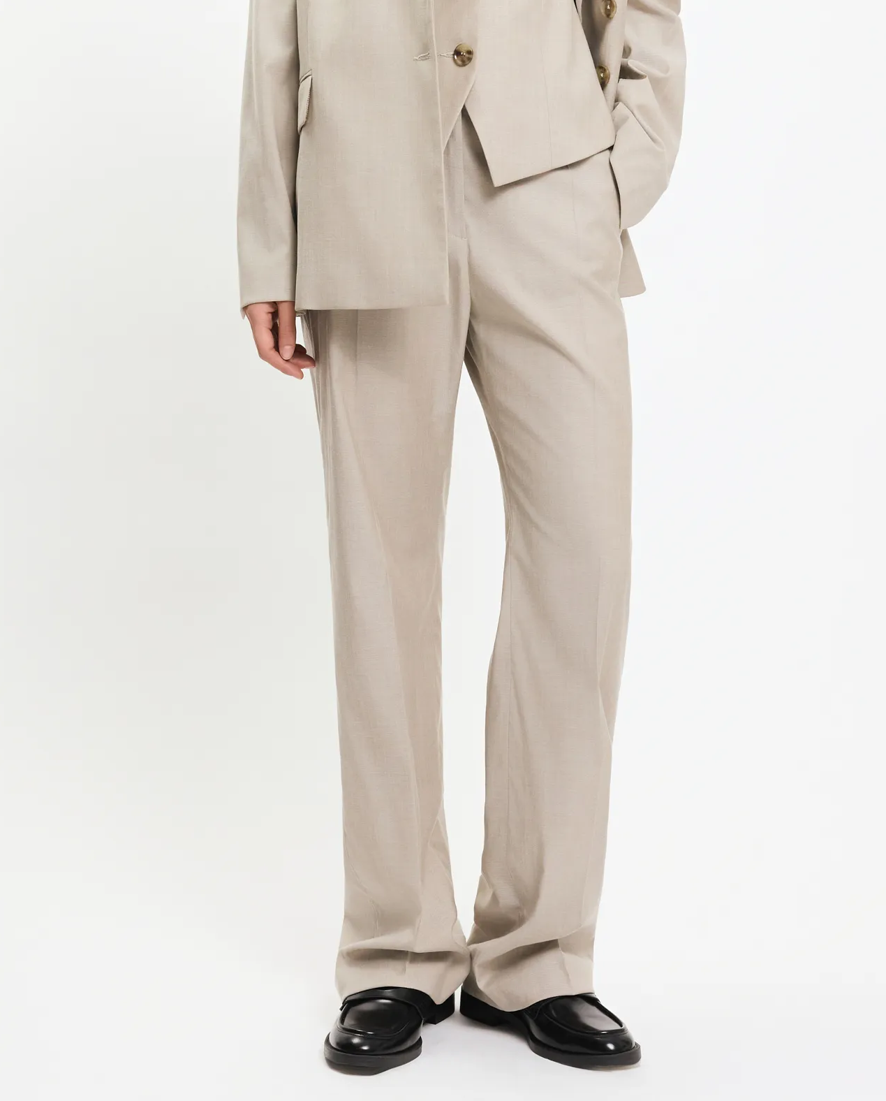 Eleganckie beżowe spodnie - Image #0