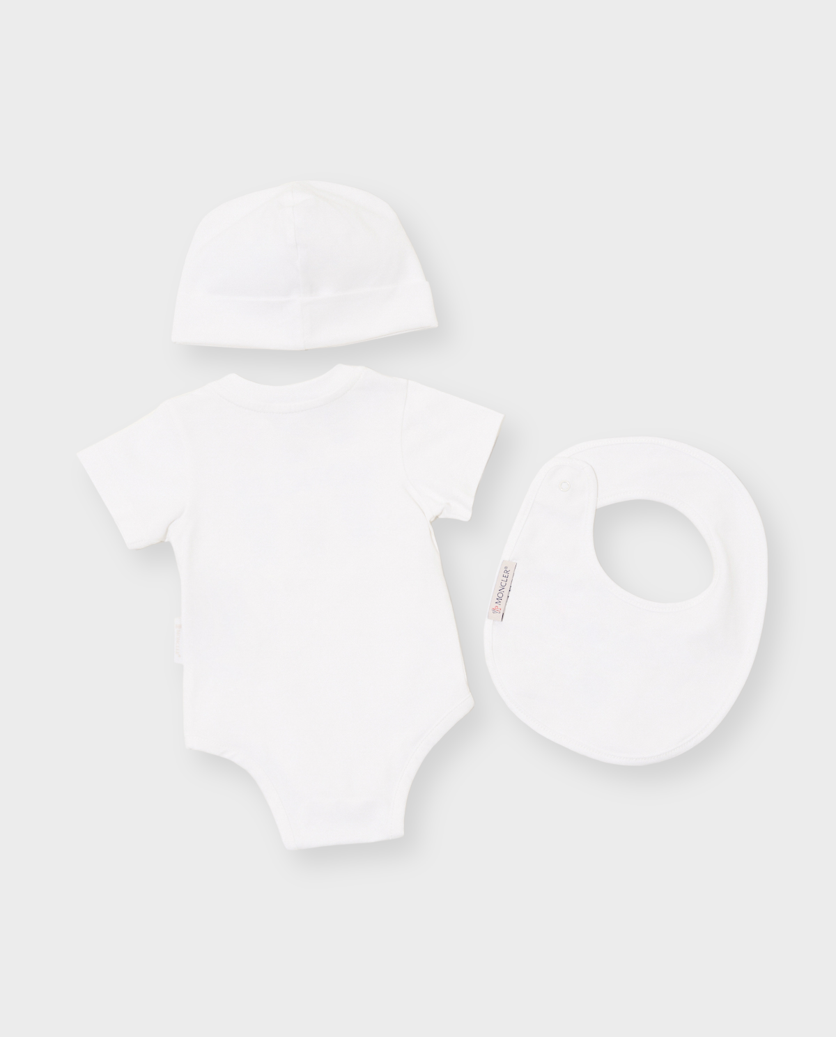 Białe śpioszki z czapką i śliniakiem - Image #1