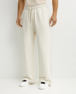 Kremowe spodnie dresowe - Image #0