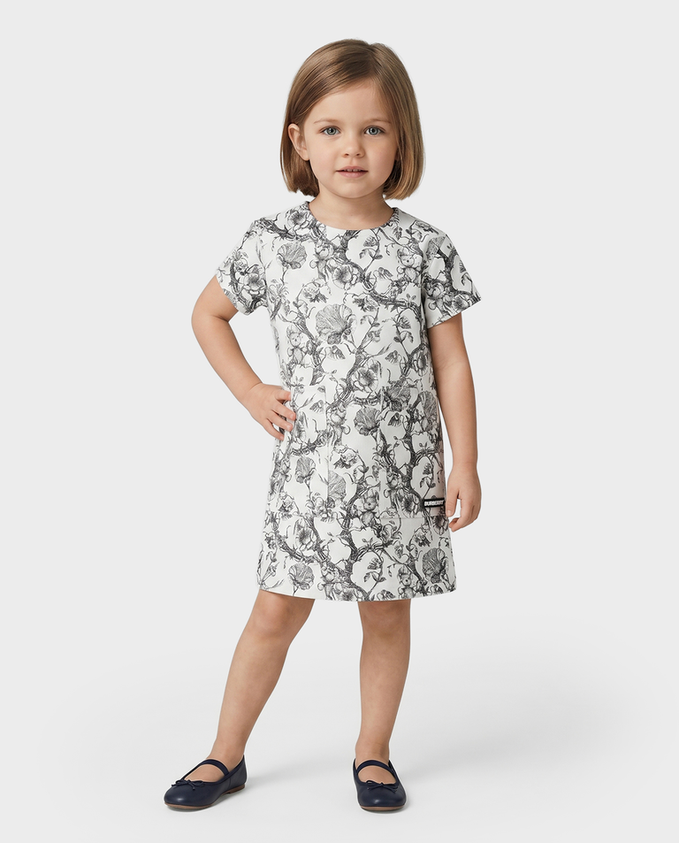 Biała sukienka w czarny print