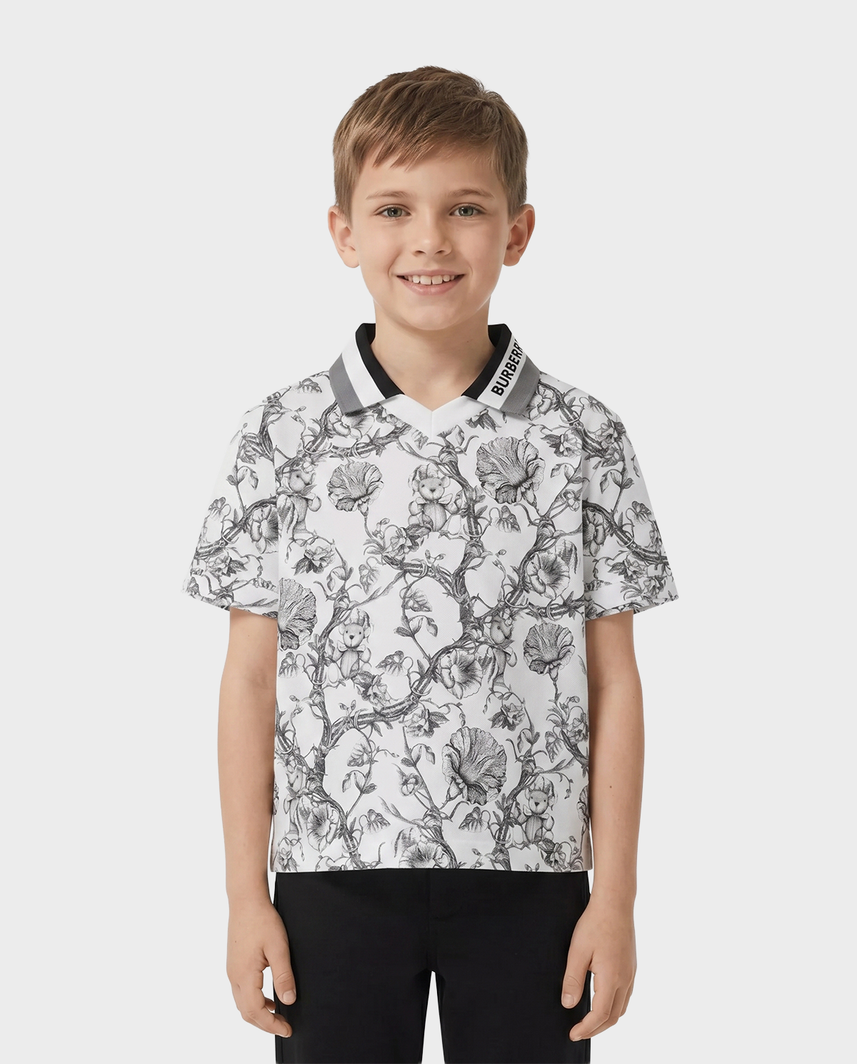 T-shirt polo w kwiatowy print - Image #0