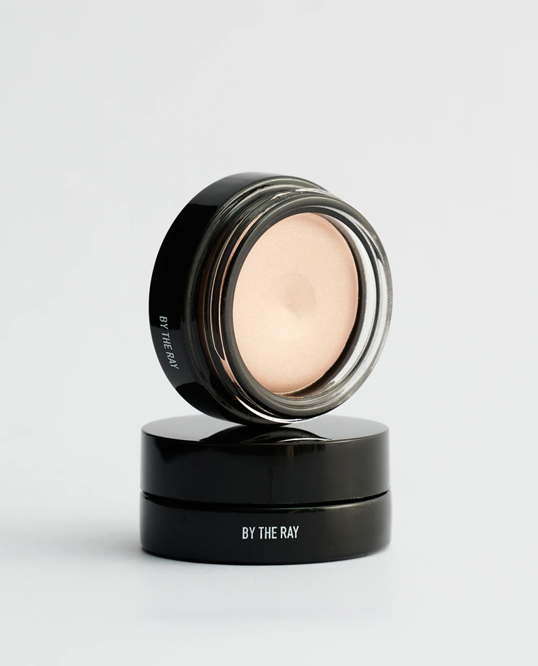 Pielęgnujący rozświetlacz do twarzy i ciała CRÈME GLOW