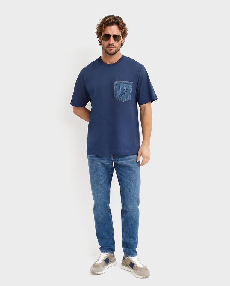 Jeansy slim-fit z  plakietką z logo