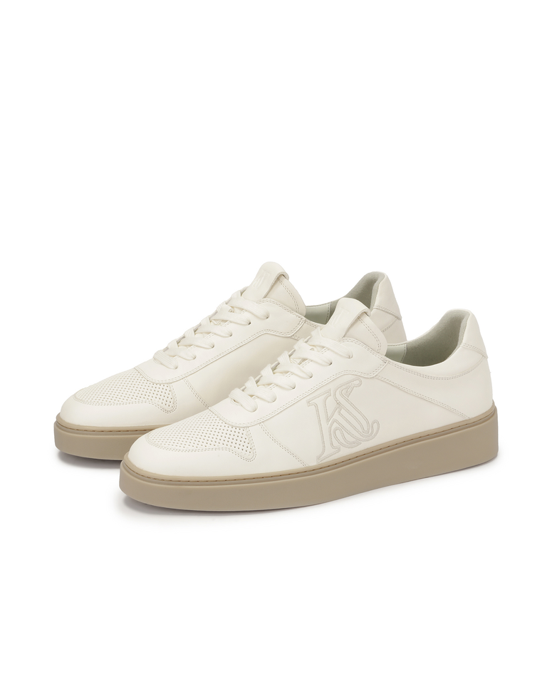 Skórzane sneakersy w kolorze złamanej bieli z wyszywanym logo KS ETIENNE
