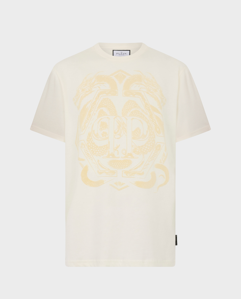 Kremowy t-shirt z motywem smoka