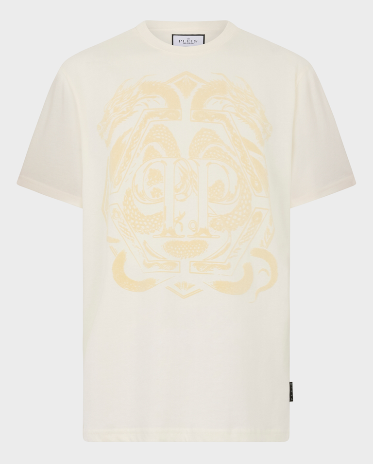 Kremowy t-shirt z motywem smoka