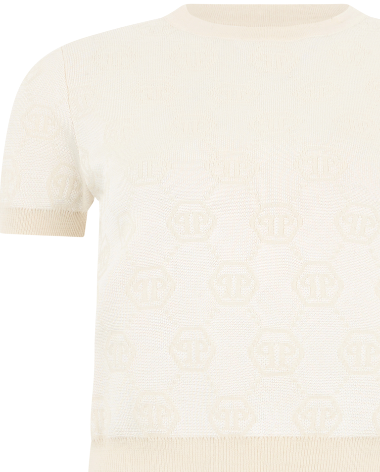 Kremowy sweter z monogramem