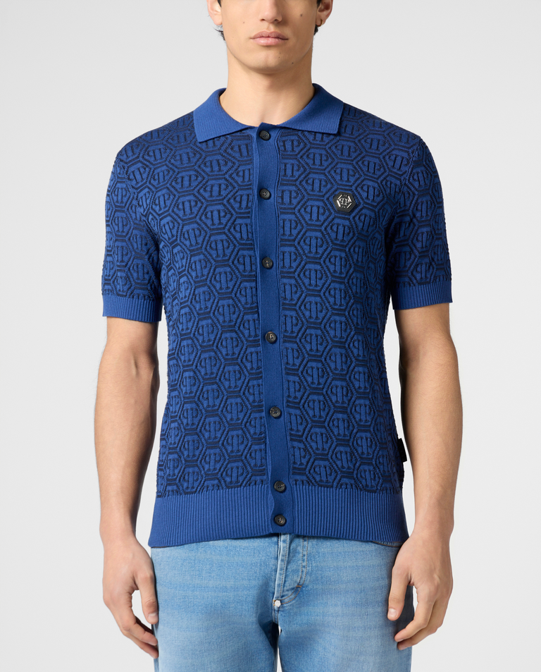 Niebieska bluzka polo z monogramem