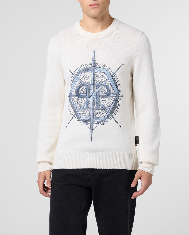 Kremowy sweter Wind Rose