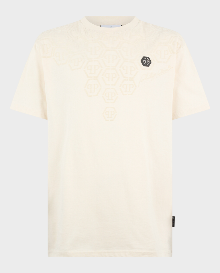 Beżowy t-shirt z ozdobnym monogramem