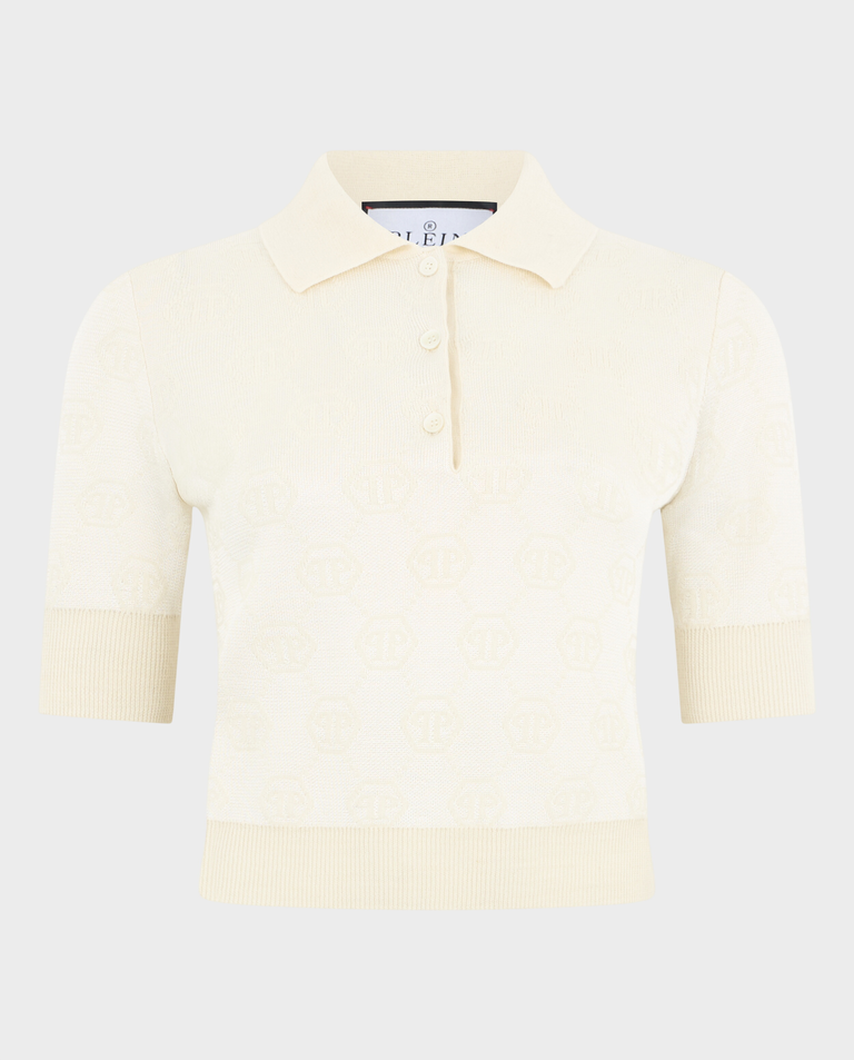 Kremowy sweter polo z monogramem