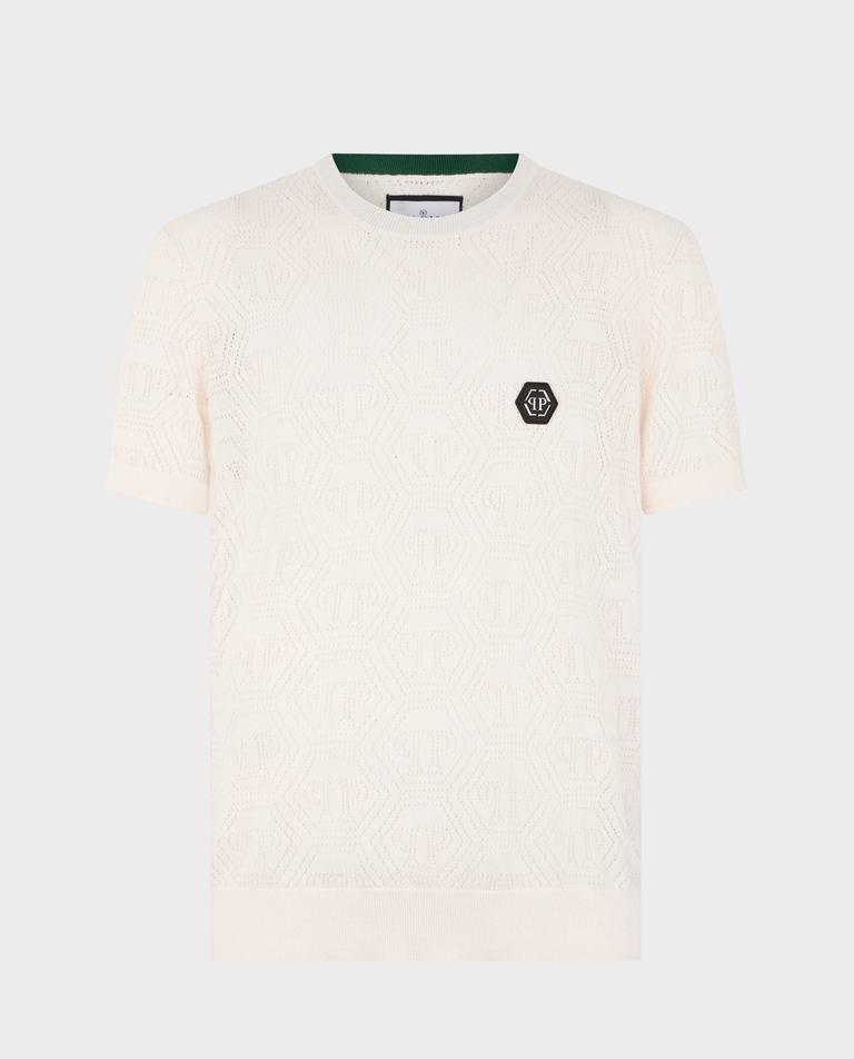 Kremowy t-shirt z ażurowym monogramem